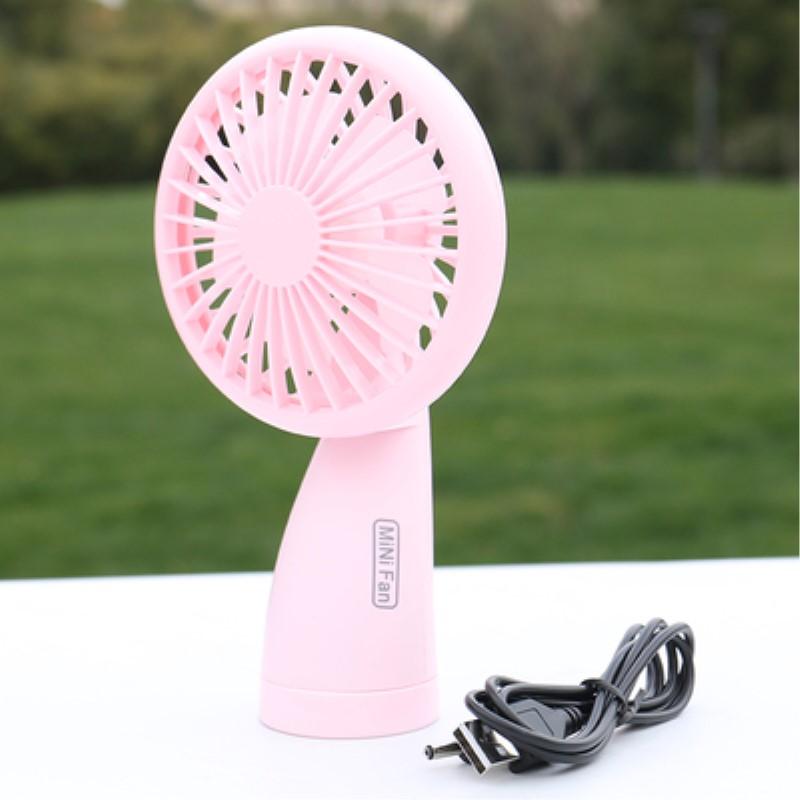Handheld Mini fan พัดลมพกพาขนาดเล็กชาร์จสายUSBใส่ถ่านลมแรง pink Handheld Mini fan พัดลมพกพาขนาดเล็กชาร์จสายUSBใส่ถ่านลมแรง pink