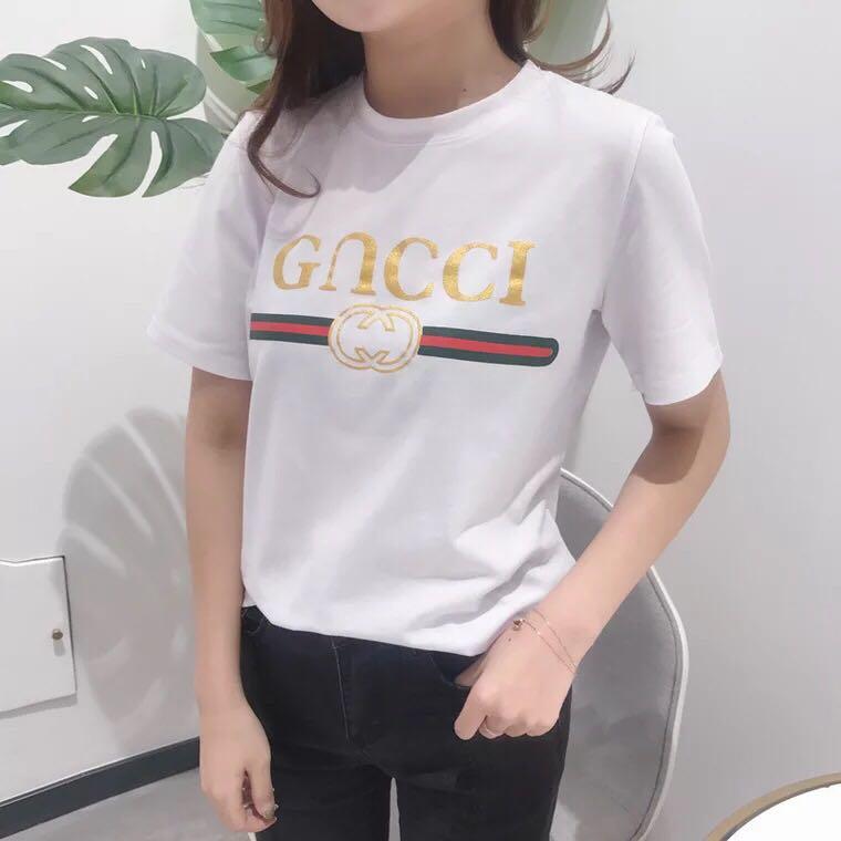 GUCCI2018 ฤดูร้อนรุ่นเกาหลีของแฟนลดสัดส่วนบางตัวอักษรตัวสั้นเสื้อนักเรียนหญิงสาวน้องสาวอ่อนนุ่มเสื้อ bottoming เสื้อ GUCCI2018 ฤดูร้อนรุ่นเกาหลีของแฟนลดสัดส่วนบางตัวอักษรตัวสั้นเสื้อนักเรียนหญิงสาวน้องสาวอ่อนนุ่มเสื้อ bottoming เสื้อ
