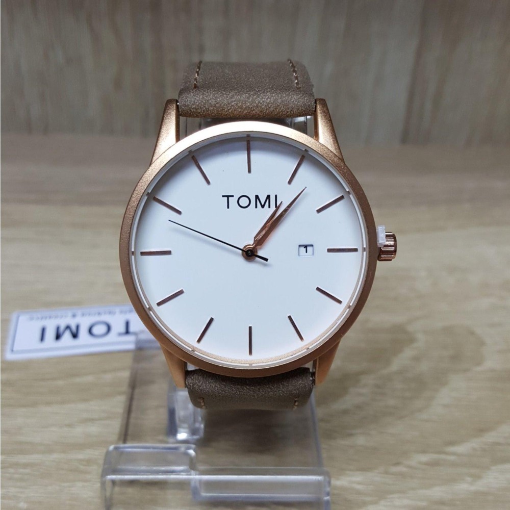 Tomi แท้ 100% หน้าปัดกลม มีช่องบอกวันที่ สายหนังกลับ ใส่ได้ทั้งชายและหญิง