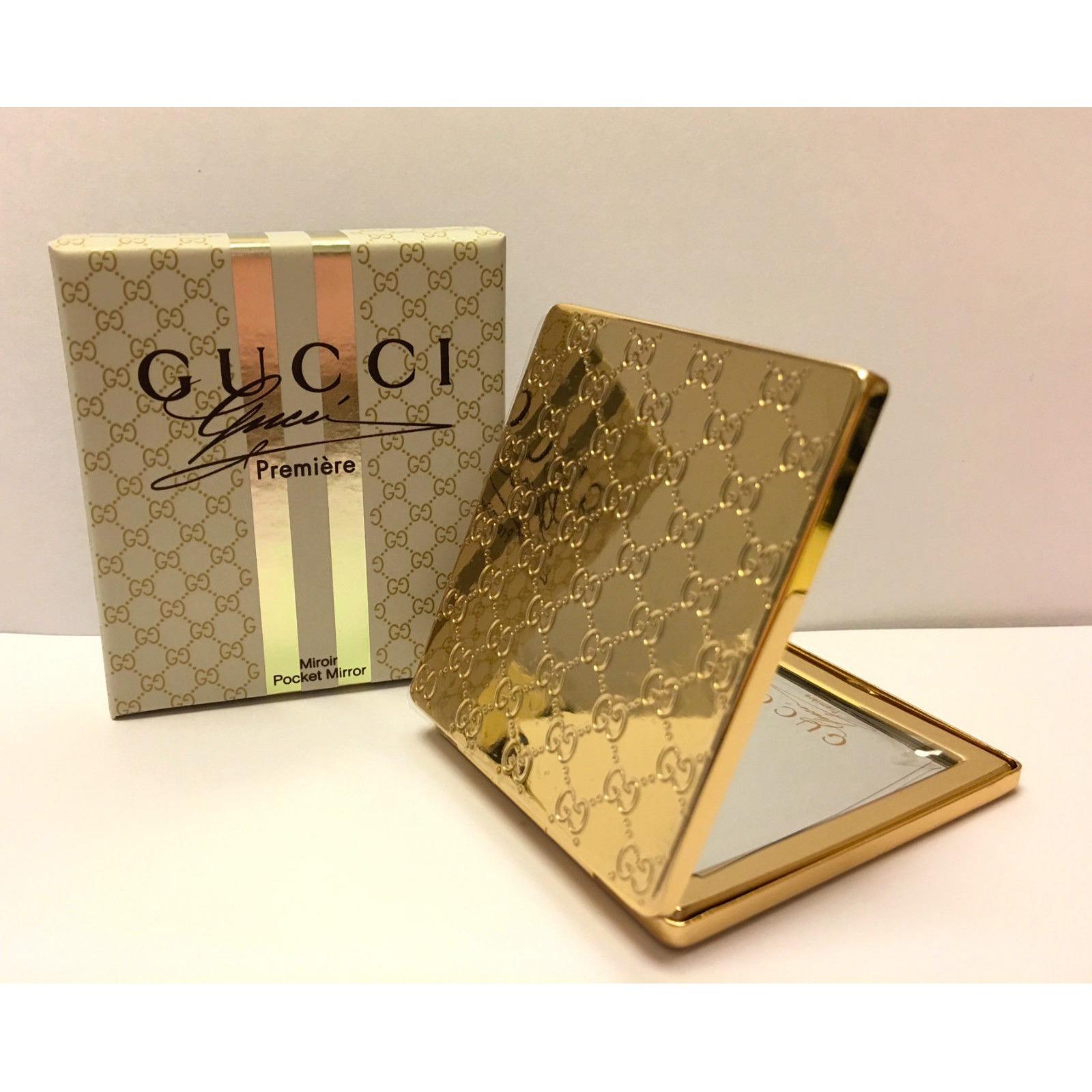 กระจกแต่งหน้าขนาดพกพา สีทอง สลักโลโก้ พร้อมกล่อง Gucci กระจกแต่งหน้าขนาดพกพา สีทอง สลักโลโก้ พร้อมกล่อง Gucci