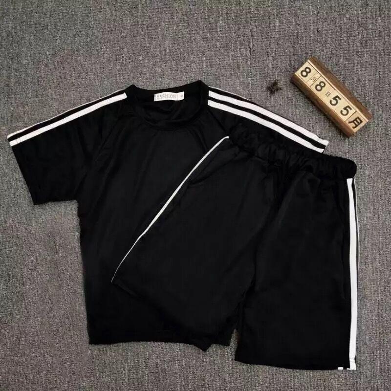KK ชุดเซต 2 ชิ้น เสื้อคอกลม แต่งแถบด้านข้าง + กางเกงขาสั้น เชือกผูกเอว แต่งแถบข้าง (สีดำ สีขาว)รุ่น 0034
