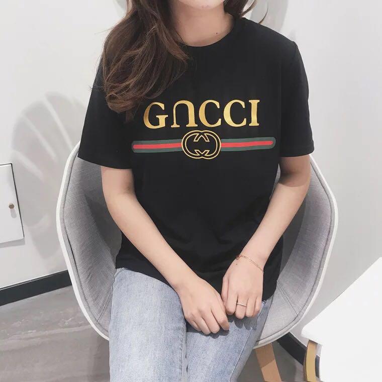 GUCCI2018 ฤดูร้อนรุ่นเกาหลีของแฟนลดสัดส่วนบางตัวอักษรตัวสั้นเสื้อนักเรียนหญิงสาวน้องสาวอ่อนนุ่มเสื้อ bottoming เสื้อ GUCCI2018 ฤดูร้อนรุ่นเกาหลีของแฟนลดสัดส่วนบางตัวอักษรตัวสั้นเสื้อนักเรียนหญิงสาวน้องสาวอ่อนนุ่มเสื้อ bottoming เสื้อ