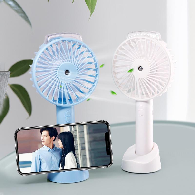 2019 Mini Fan พัดลมไอน้ำ พัดลมไอเย็นแบบพกพา พัดลมพกพาขนาดเล็ก ตั้งมือถือได้ มีแบตเตอรี่ในตัว 1200 mAh USB ชาร์จ ปรับความแรงได้ 3 ระดับ (3 สี) 2019 Mini Fan พัดลมไอน้ำ พัดลมไอเย็นแบบพกพา พัดลมพกพาขนาดเล็ก ตั้งมือถือได้ มีแบตเตอรี่ในตัว 1200 mAh USB ชาร์จ ปรับความแรงได้ 3 ระดับ (3 สี)