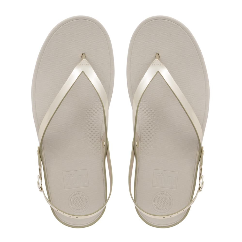 FITFLOP รองเท้าแตะหญิงรุ่น FLIP LEATHER SANDALS สี GOLD MIRROR