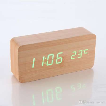 นำเสนอสินค้าดี นาฬิกาดิจิตอลตั้งโต๊ะลายไม้ Digital LED Wooden Alarm Clock บอกเวลา
บอกวันเดือนปี ตั้งปลุก และวัดอุณหภูมิได้ ฟังค์ชั่นครบครัน ลายไม้สีน้ำตาลอ่อน ไฟ LED สีเขียว
(Brown/Green) โปรโมชั่นลดราคา