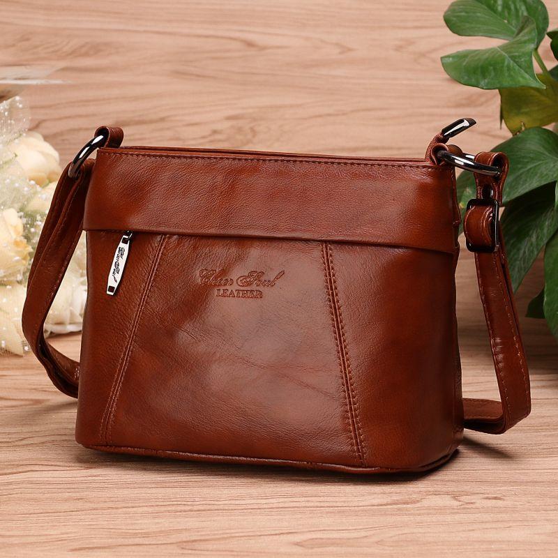 cowhide luggage bags