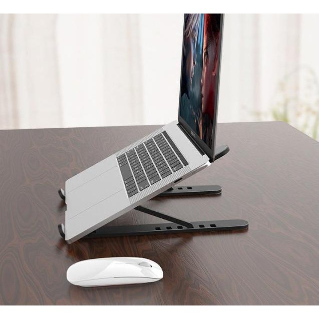 ลดราคาพิเศษ ขาตั้งแล็ปท็อปแบบพับได้ Macbook โน๊ตบุ๊ค Ipad P1 สีชมพู ราคาถูก โปรโมชั่นพิเศษ ขาตั้งแล็ปท็อปอลูมิเนียมแบบพับเก็บได้สําหรับแล็ปท็อป ที่วางโน๊ตบุ๊คขาตั้งแล็ปท็อปพับได้กันลื่น ที่วางแบบพับเก็บได้ ชั้นวางโน้ตบุ๊คแบบพกพา พับได้