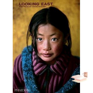 Positive attracts positive !  LOOKING EAST: PORTRAITS BY STEVE MCCURRY