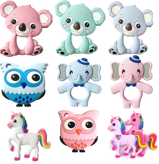 ยางกัดเด็กปลอดสารพิษ, FDA , ออกแบบรูปสัตว์สนุก    Non-toxic Baby Teether, FDA Approved, Fun Animal Shape Designs  สีวัสดุ แรคคูน ชมพู Magenta Raccoon