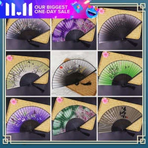 ภาพหน้าปกสินค้าBamboo Flower Fan Molor Vintage Hand Fan 7 Inch Folding Fan Chinese Style Female Cheongsam Props Cloth Gift Decoration Wedding Folding Fan Party Home Hand Folding Fan Drawing Print Fan S Fan ซึ่งคุณอาจชอบสินค้านี้