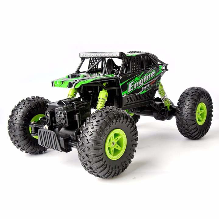 รถไต่หิน รถบังคับวิทยุ รถบิ๊กฟุต ออฟโรด off-road 4WD รีโมท 2.4Ghz. WLtoys scale 1:18 4WD RC Climbing Car - สีเขียว