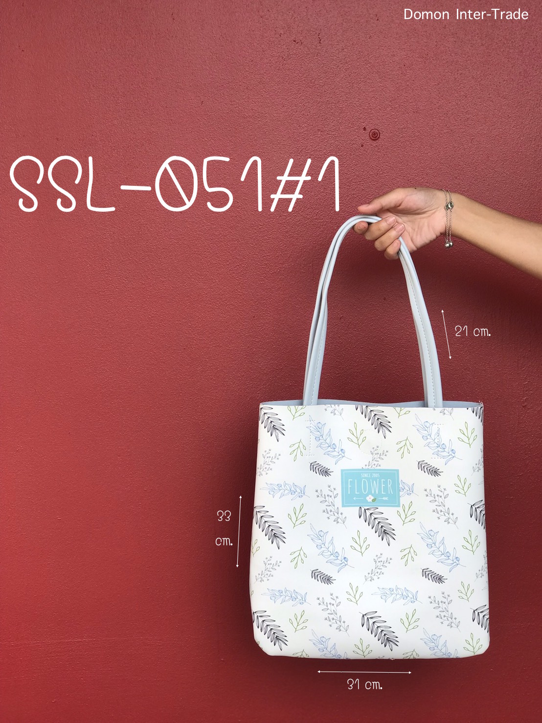 กระเป๋าสะพายหนังเทียม  31x33 cm. หูยาว 21 cm.