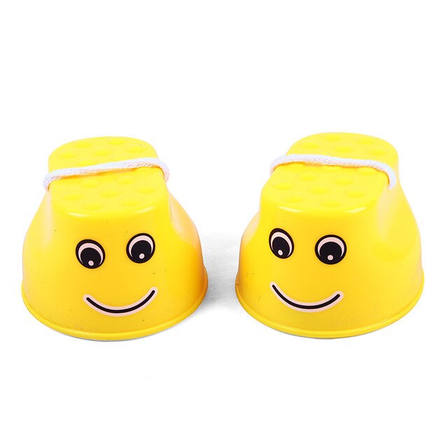 1คู่พลาสติกกลางแจ้งการฝึกสมดุลอุปกรณ์ Smile กระโดด Stilts เกมความร่วมมือกระโดดฟุต Stilts สำหรับของเล่นเด็กของขวัญ
