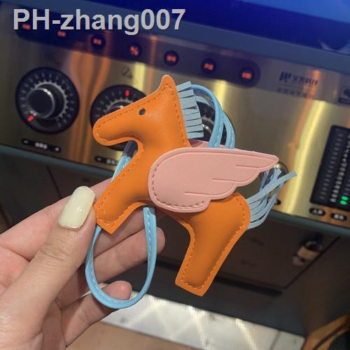 Luxury PU Leather Angel Wings Flying Horse Car Keychain for Ladies