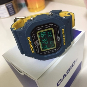 สินค้า นาฬิกา CASIO ยักเล็ก ทูโทนสีกลมเหลือง ตั้งเวลาให้พร้อมใช้งาน แถมฟรีกล่องใส่