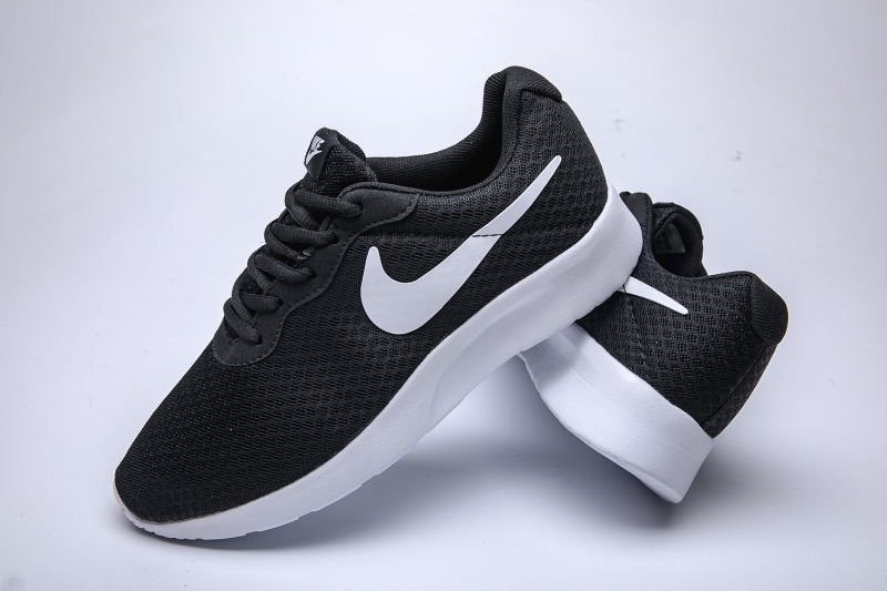 mens black nike tanjun