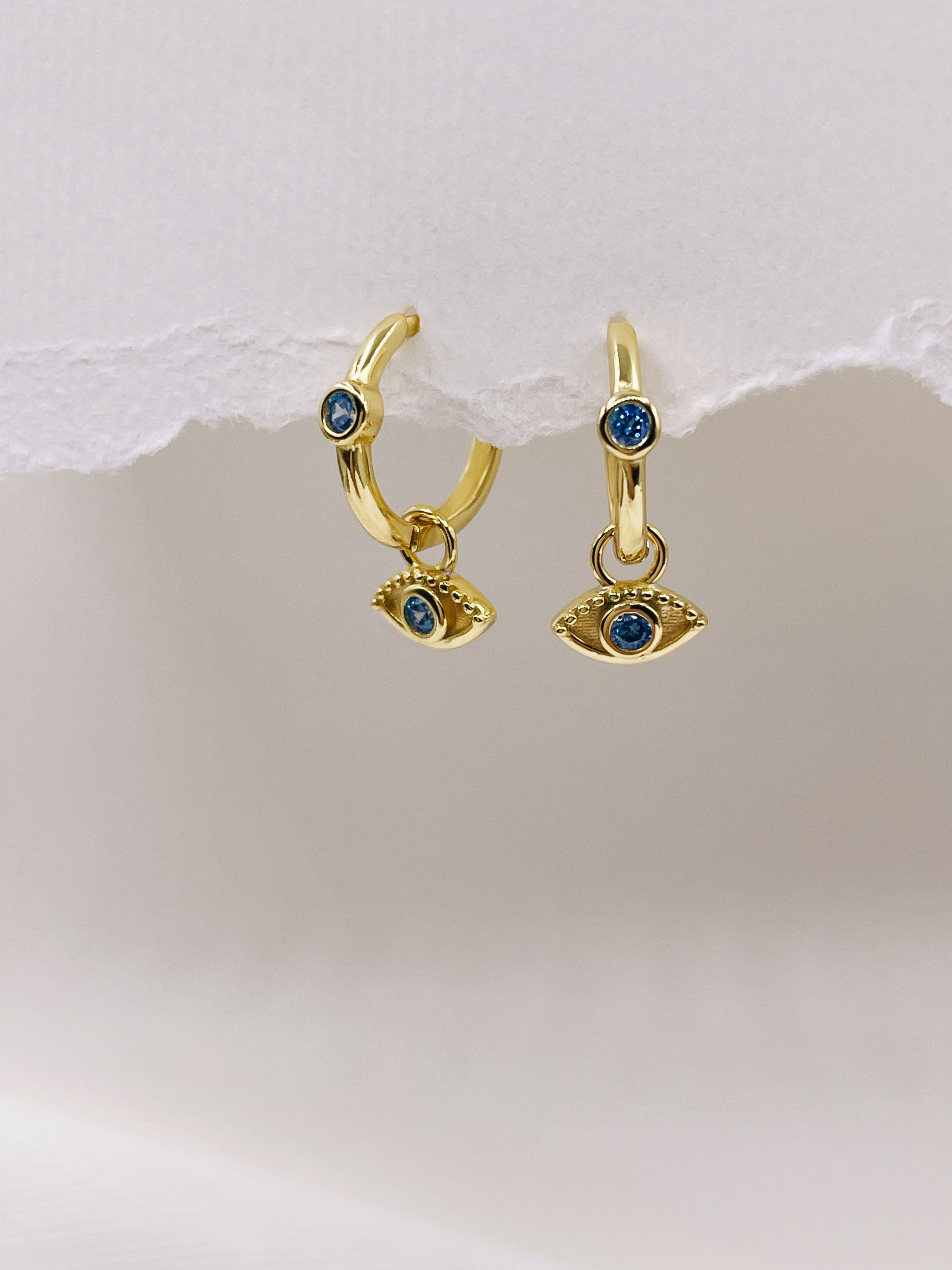 Crystal Evil Eye Huggie Hoop Earrings in Gold | Lisa Angel