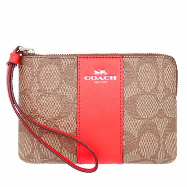 COACH กระเป๋า CORNER ZIP WRISTLET IN SIGNATURE COATED CANVAS WITH LEATHER STRIPE F58035 SVC8O (SV/Khaki/Bright Orange)