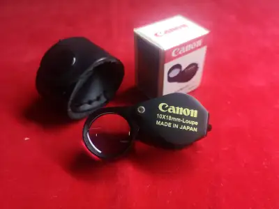 กล้องส่องพระ/ส่องเพรช Canon สีดำ เลนส์แก้วสองชั้น 10x18mm แถมฟรีซองหนังวัวแท้ตรงรุ่น