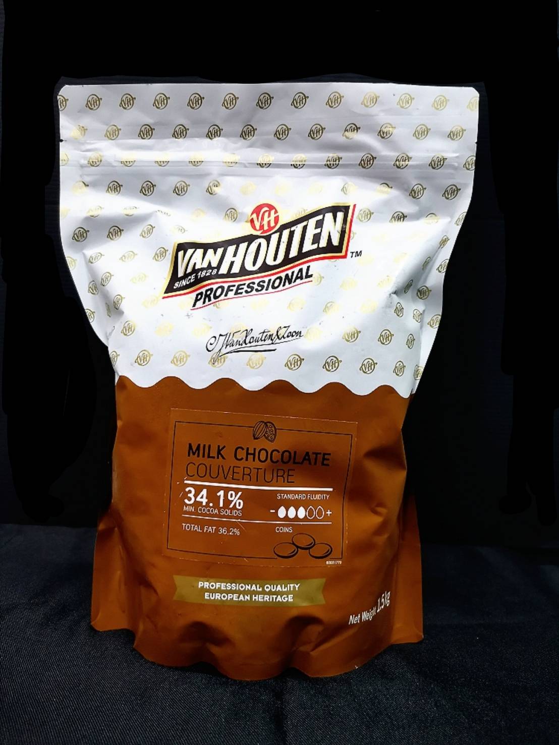 แวน34.1% 1.5Kg Van Houten 34.1% มิลค์ ช็อคโกแลต คูเวอร์เจอร์ / Van Houten Milk Chocolate Couverture34.1% / 1.5Kg
