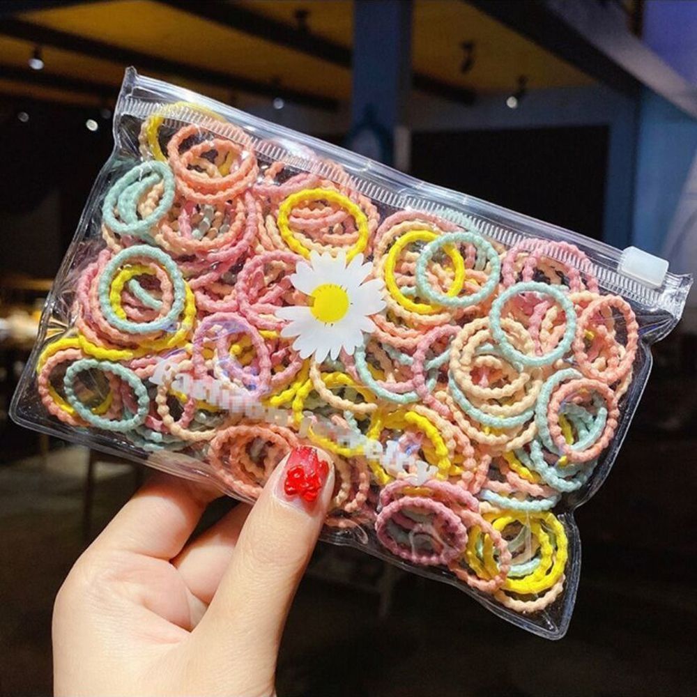 TRADER 100PCS/Bag Trẻ em Cao su Dây buộc tóc đáng yêu Màu sắc Dây buộc tóc Giá đỡ tóc đuôi ngựa Dây buộc tóc trẻ em Dây buộc tóc