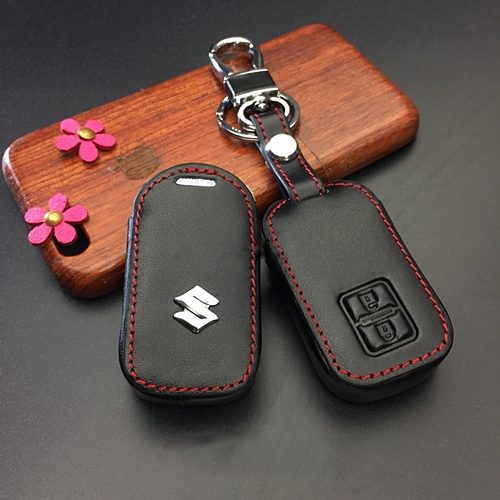 ซองหนังหุ้มกุญแจรีโมทรถยนต์  ซองหนังแท้ ซองรีโมท ประดับยนต์ เคสกุญแจหนังแท้ ปลอกหนังกุญแจรถยนต์ ประดับยนต์ ตกแต่ง กุญแจรถ SUZUKI รุ่น Swift 2018 โลโก้เหล็ก (สมาร์คีย์) (2ปุ่มกด) (1ชิ้น) สีดำ