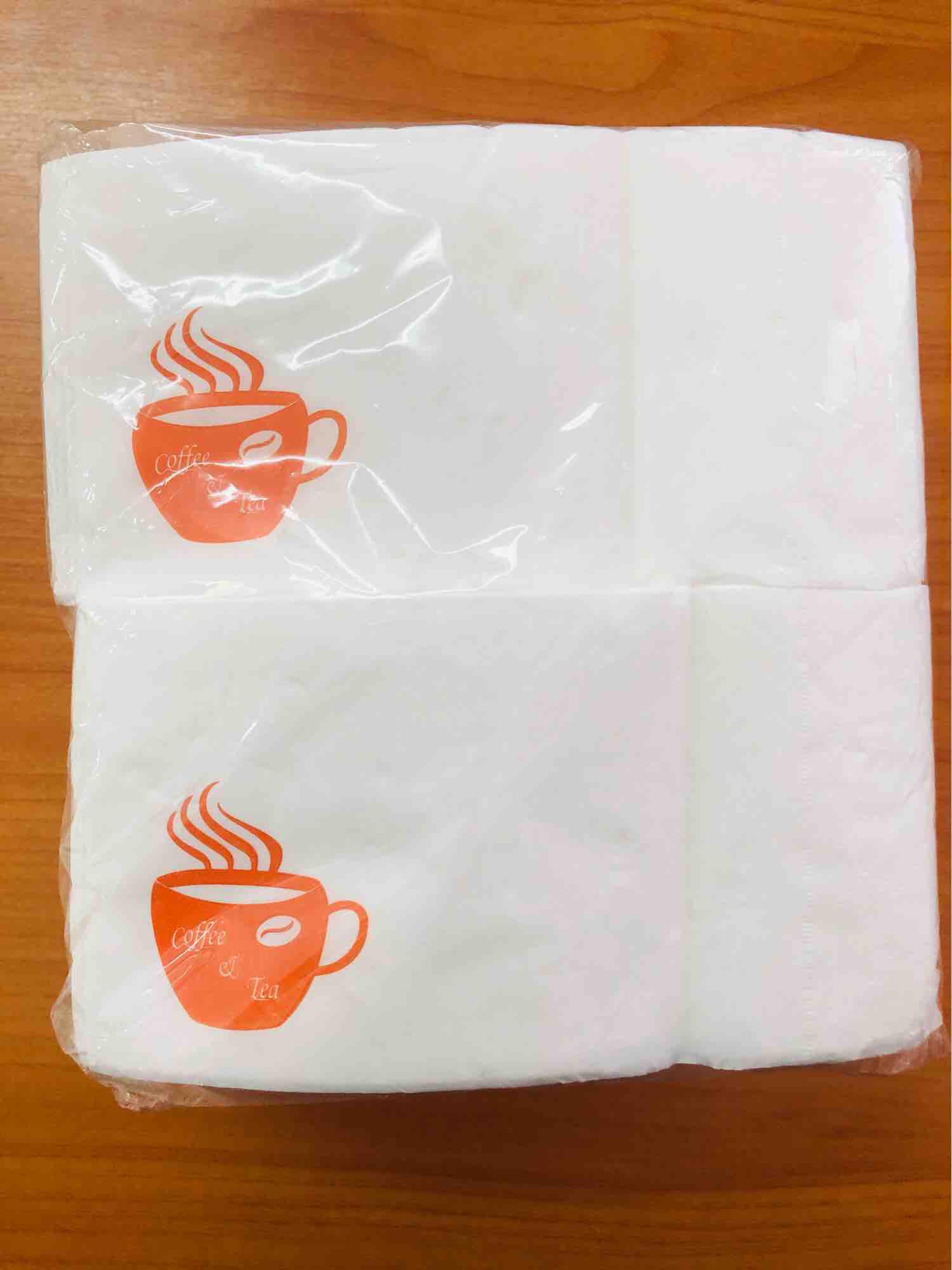 กระดาษเนปกิ้น กระดาษเช็ดปาก  กระดาษพันแก้วกาแฟ กระดาษทิชชู สีขาวพิมพ์ลายคำว่า  Coffee & Tea  (พิมพ์ลายสีส้ม)บรรจุ 200 แผ่นต่อห่อ