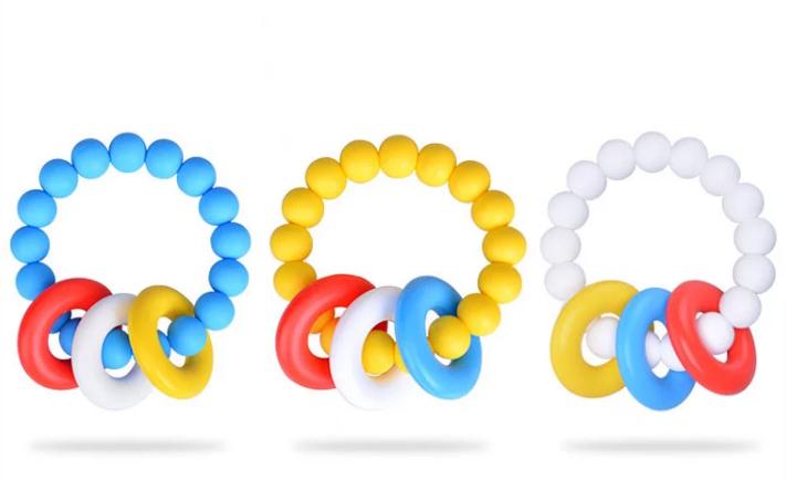 ยางกัดเด็กซิลิโคนสีสันสดใสพร้อมสร้อยข้อมือและแหวนทำเสียงมี 3 สีให้เลือก     Colorful Silicone Baby Teether with Bracelet Shape and Noise Making Rings, 3 Colors Available