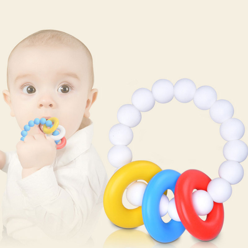 ของเล่นเสริมพัฒนาการยางกัดแบบวงแหวนสำหรับทารกซิลิโคน BPA ฟรีคุณภาพสูง     Baby Teething Ring Toy, High Quality BPA Free Silicone  สีวัสดุ White