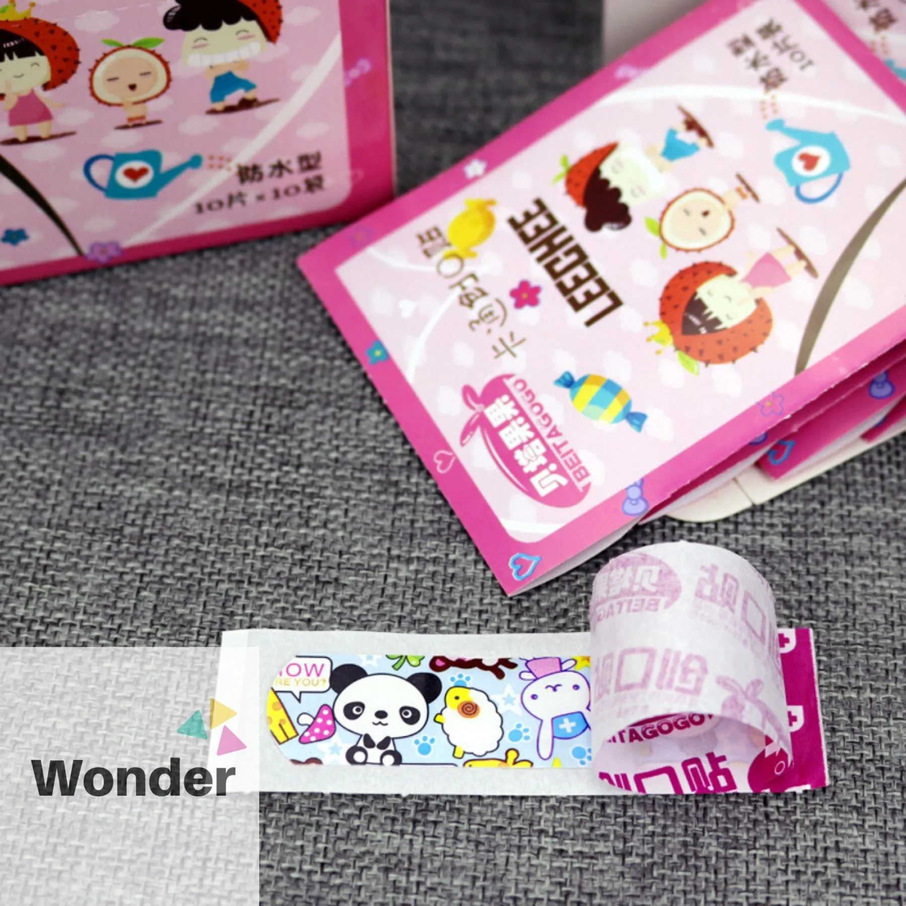 ราคา/1 ซอง(10 ชิ้น) พลาสเตอร์ปิดแผล พลาสเตอร์ยา ลายการ์ตูนสุดน่ารัก พลาสเตอร์เด็ก (คละลาย) ขนาด 7x2 ซม. ติดทนติดนาน กล่องสีชมพู W003