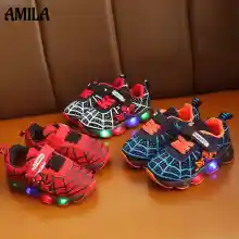 ภาพขนาดย่อของภาพหน้าปกสินค้าAMILA รองเท้าผ้าใบสำหรับเด็ก,รองเท้ากีฬารองเท้าวิ่งมีไฟ LED กระพริบเดี่ยว จากร้าน AMILA Shopping mall บน Lazada