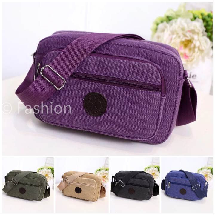 Fashion handbag กระเป๋าผ้า กระเป๋าสะพายข้างผ้าไนล่อนช่องเยอะสุดคุ้มST-658 – No Brand >>> top1shop >>> lazada.co.th