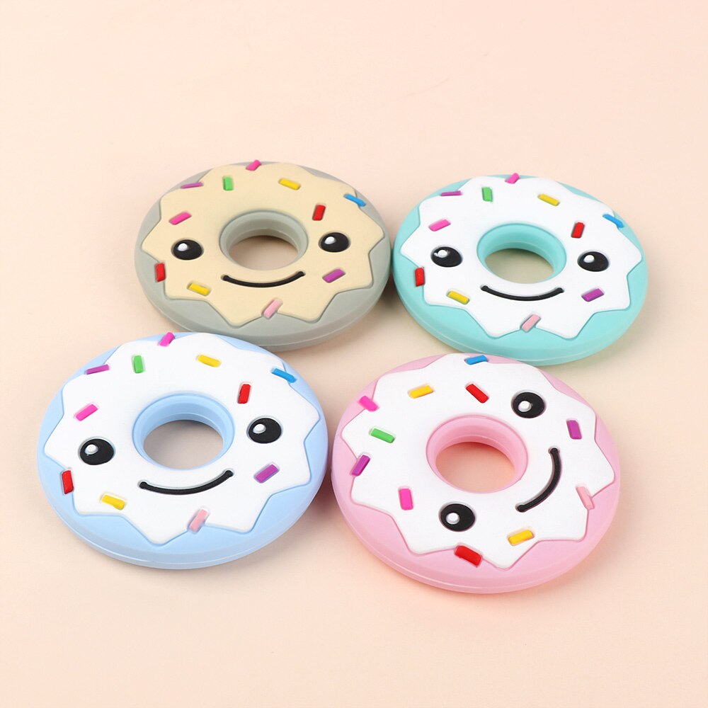 ยางกัดเด็กปลอดสารพิษ, FDA , ออกแบบรูปโดนัท    Non-toxic Baby Teether, FDA Approved, Fun Donut Shape Designs  สีวัสดุ Blue