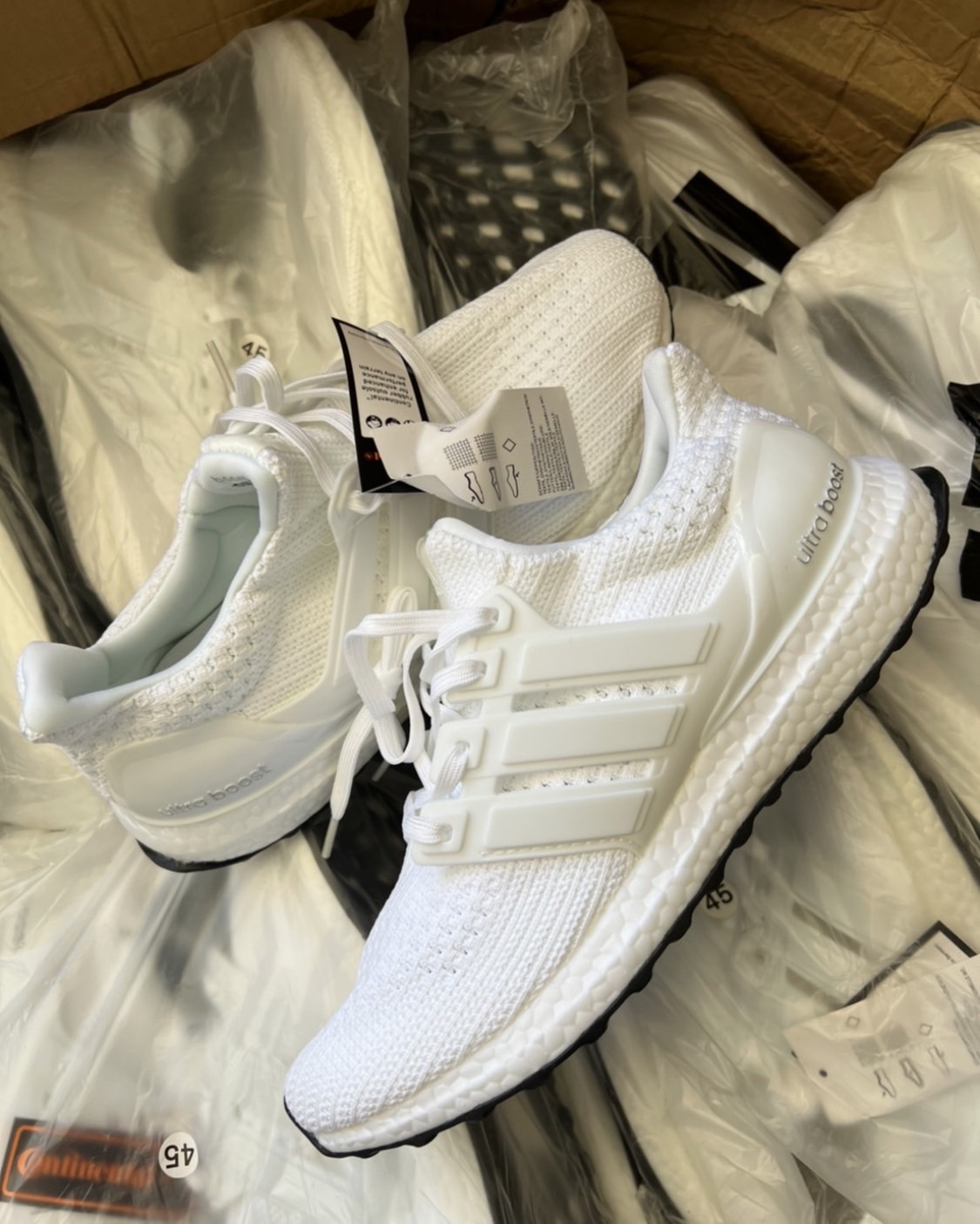 ultra boost white with red stripes