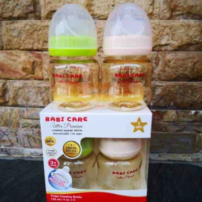 ขวดนมคอกว้าง 4 ออนซ์ สีชา แพ็คคู่ พร้อมจุกนม สามารถใส่จุกนมพีเจ้นได้ค่ะ ยี่ห้อ Babi Care Ultra Premium