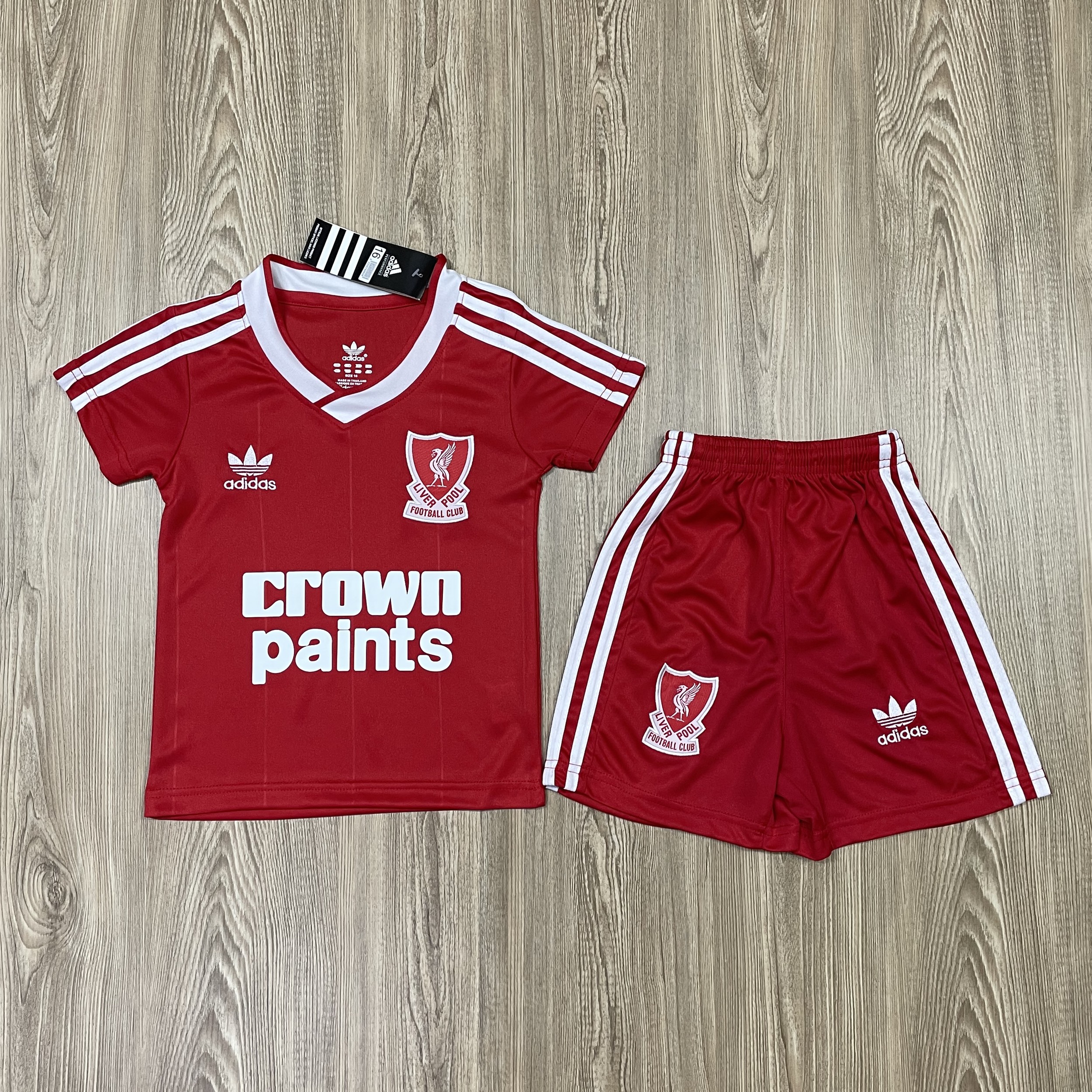 ชุดบอลเด็ก Liverpool ชุดกีฬาเด็ก ทีมลิเวอร์พูล เสื้อบาซ่า  ซื้อครั้งเดียวได้ทั้งชุด (เสื้อ+กางเกง) ตัวเดียวในราคาส่ง สินค้าเกรด-A
