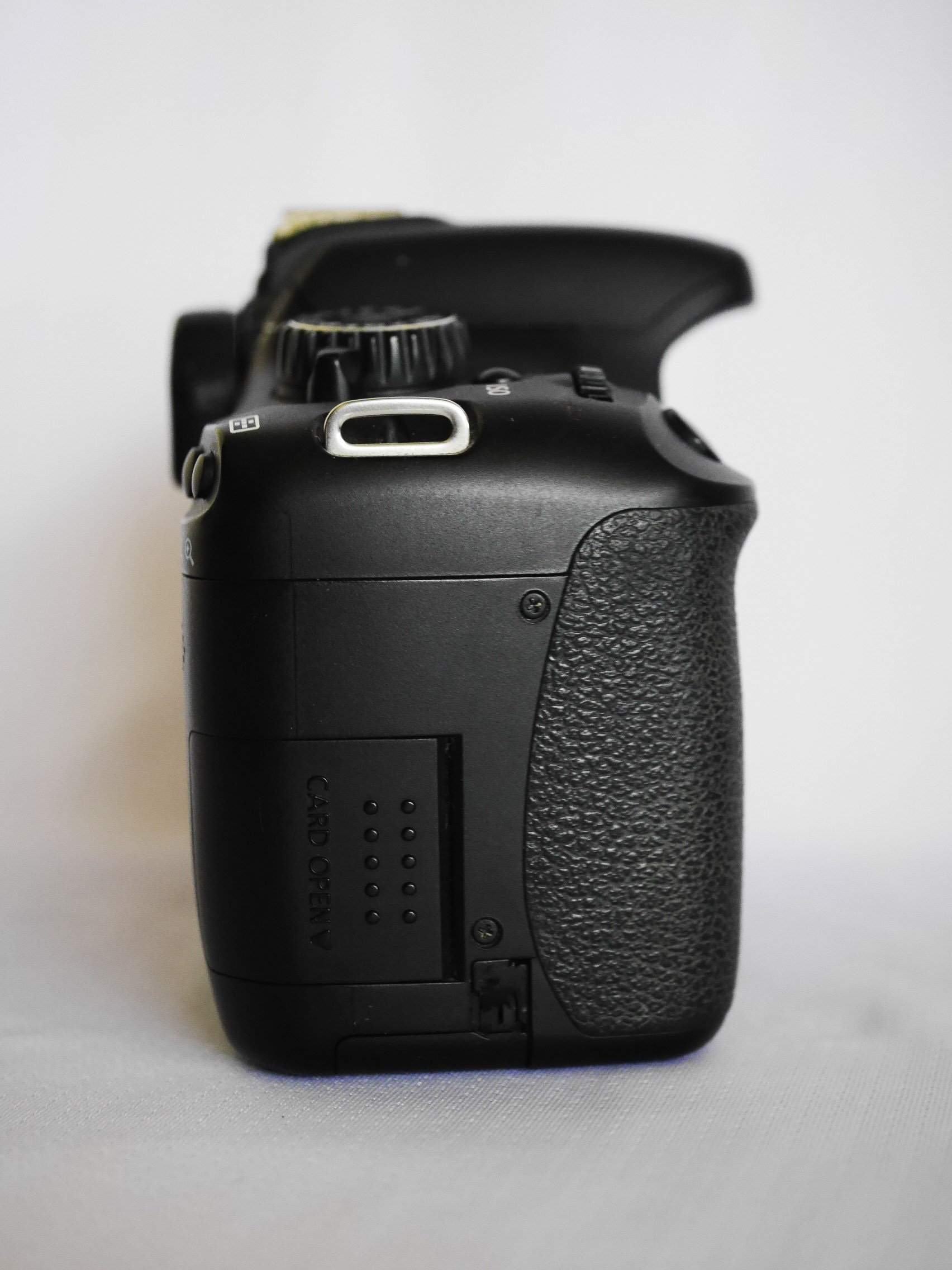 Canon EOS 550D or Rebel T2i camera placed on a rock Stock Photo