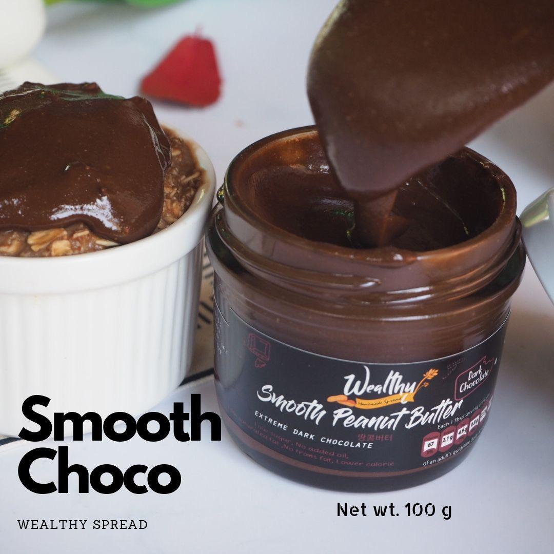 Wealthy 100 g เนยถั่วรสช็อคโกแลตเข้มข้นเนื้อเนียน หวานน้อย (Smooth Dark chocolate peanut butter)