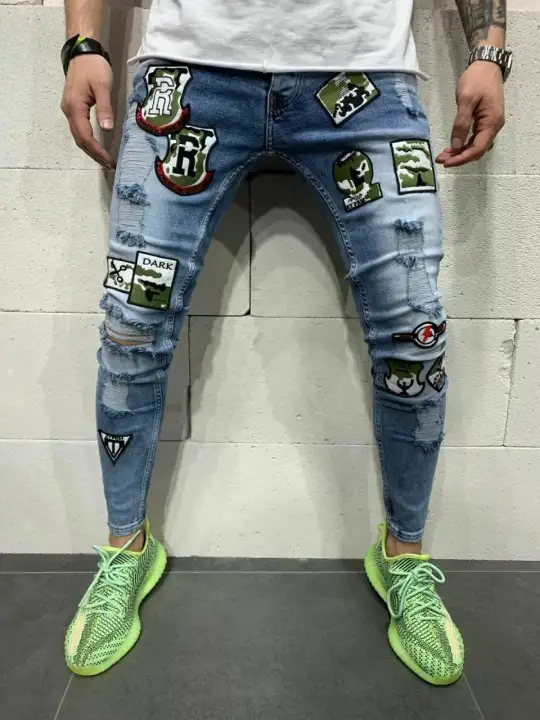 ripped patched skinny jeans