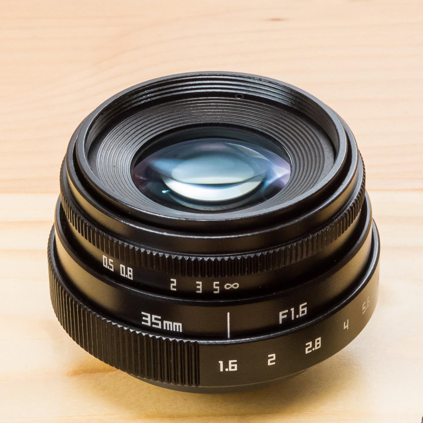 New Fujian 35mm F1.6 ( ไม่แถม Adapter ) เลนส์หน้าชัดหลังเบลอ สำหรับกล้อง Mirrorless ทุกรุ่น ( เลนส์มือหมุน )