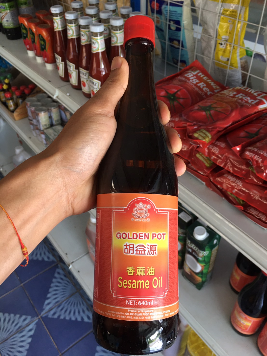 น้ำมันงา ตรา โกลเด้นพอท 640 มล. Golden Pot Sesame Oil 640 ml