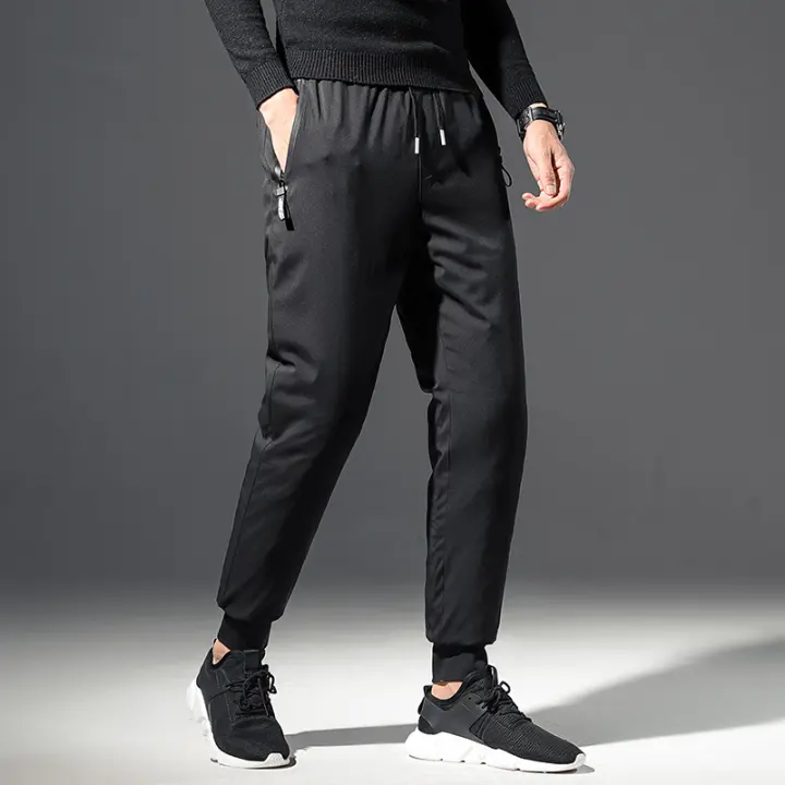 white sports trousers mens