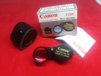 Canon Ultra HD Pro Series 10X สีดำ เลนส์แก้วสองชั้น ส่องชัดสบายตา แถมฟรีซองหนังตรงรุ่น