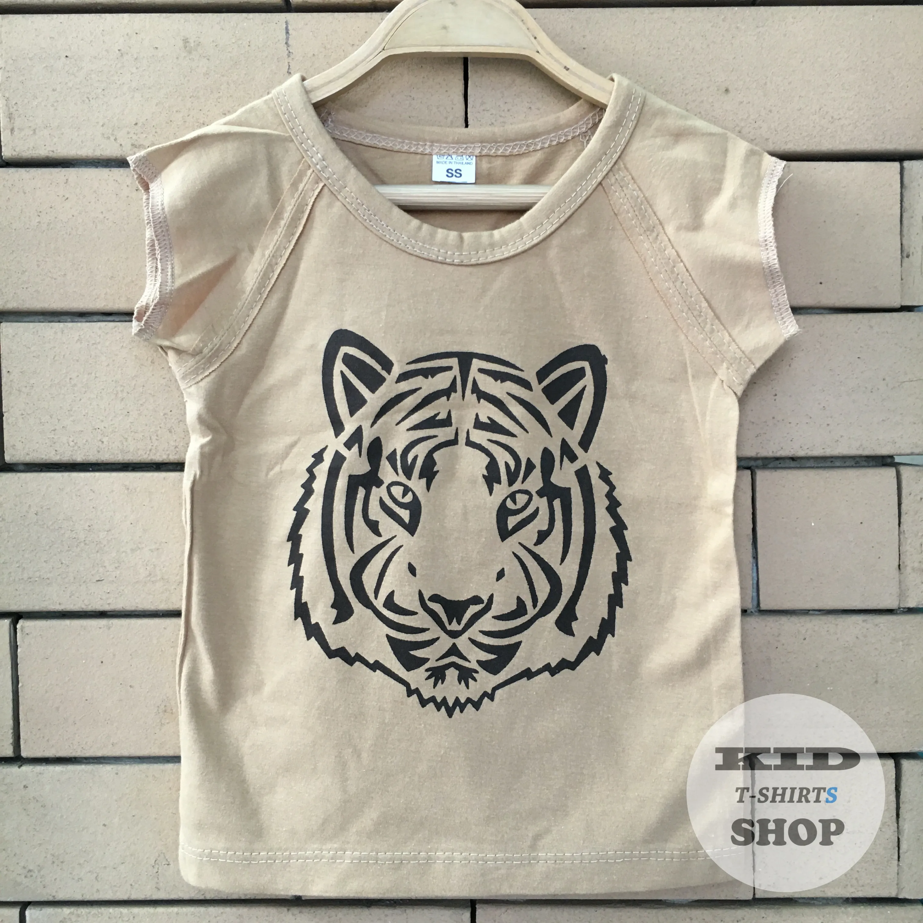 BabyOutlet เสื้อยืดเด็ก ลายหน้าเสือ Tiger เสื้อสีน้ำตาล แขนล่ำ มี 4 ไซส์ (SS , S , M , L) แขนกุด มี Size แรกเกิด - 6 ปี ผลิตจากผ้าฝ้าย 100% ชุดเด็กเนื้อผ้าดี