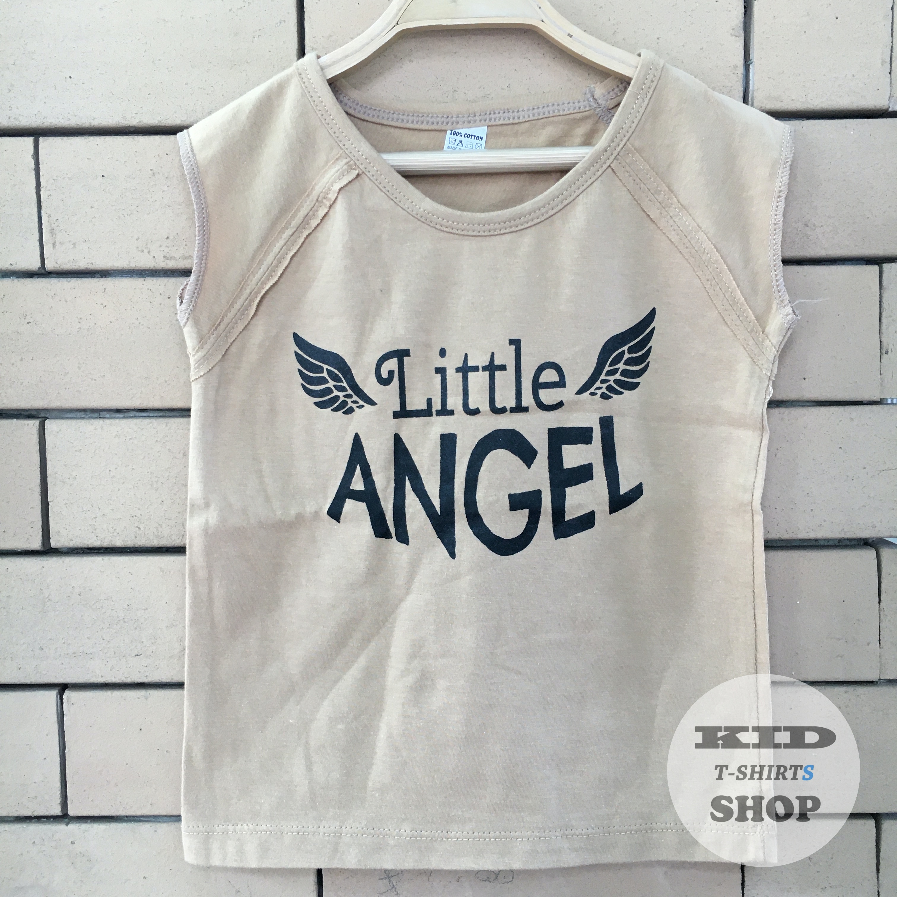 BabyOutlet เสื้อยืดเด็ก ลาย Little Angel สีน้ำตาล แขนล่ำ มี 4 ไซส์ (SS , S , M , L) เสื้อเด็ก มี Size แรกเกิด - 6 ปี แขนกุด ผลิตจากผ้าฝ้าย 100% ชุดเด็ก